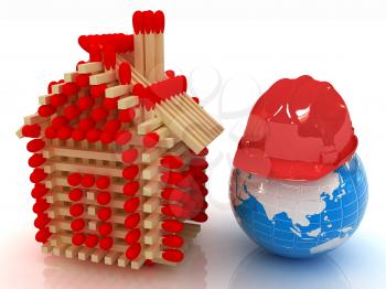 Log house from matches pattern on white and hard hat on earth 