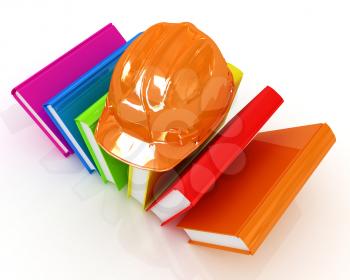 Colorful books and hard hat on a white background