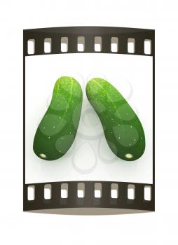 fresh cucumbers on a white background. The film strip