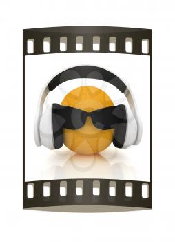 oranges with sun glass and headphones front face on a white background. The film strip