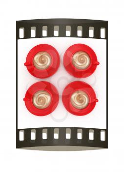 red cups of coffee with milk. The film strip
