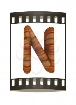 Wooden Alphabet. Letter N on a white background. The film strip