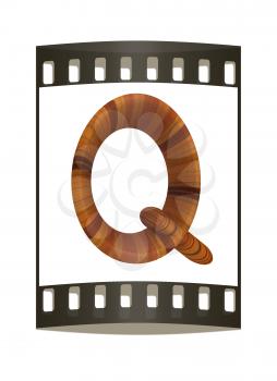 Wooden Alphabet. Letter Q on a white background. The film strip
