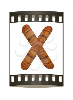 Wooden Alphabet. Letter X on a white background. The film strip