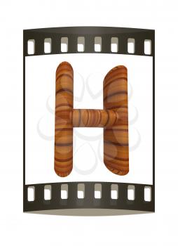 Wooden Alphabet. Letter H on a white background. The film strip