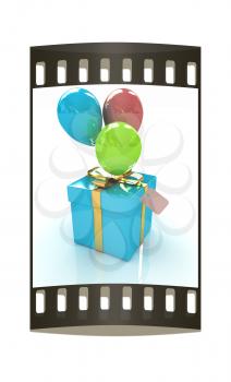 Gift box with balloon for summer on a white background. The film strip