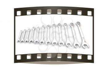 Set of wrenches on a white background. The film strip