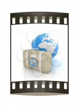 Suitcase for travel end Earth. The film strip