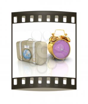 Suitcases for travel and clock. The film strip