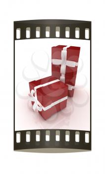Bright christmas gifts on a white background. The film strip 