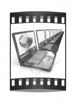 Computer Network Online concept with Eco Wooden  Laptop and Earth on white background. The film strip
