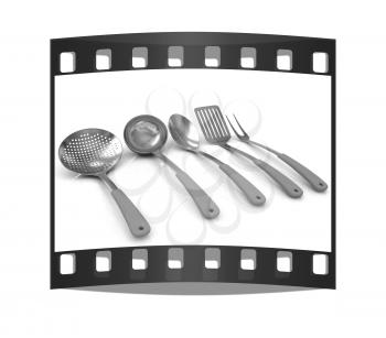 Gold cutlery on a white background. The film strip