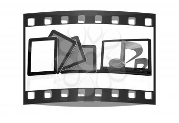 yellow note on the  laptop and  tablet pc on a white background. The film strip