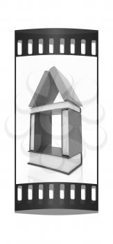 house from colorful real books on a white background. The film strip