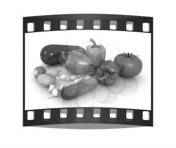 fresh vegetables with green leaves on a white background. The film strip