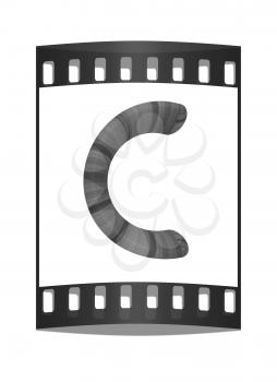 Wooden Alphabet. Letter C on a white background. The film strip