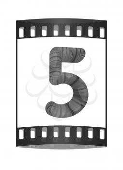 Wooden number 5- five on a white background. The film strip