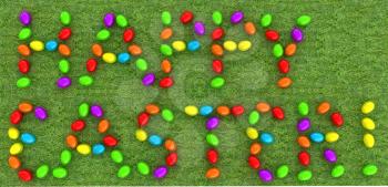 Easter eggs as a Happy Easter greeting on a green grass