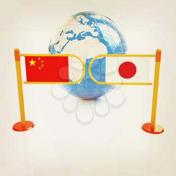 Three-dimensional image of the turnstile and flags of China and Japan on a white background . 3D illustration. Vintage style.