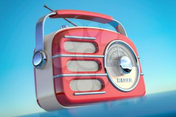 Red vintage retro style radio receiver on the sky background. 3d illustration