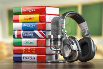 Learning languages online.  Dictionary books of different languages with headphones and microphone. 3d illustration