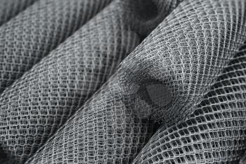 Coils of steel wire. Rabitz mesh netting rolls in warehouse. 3d illustration
