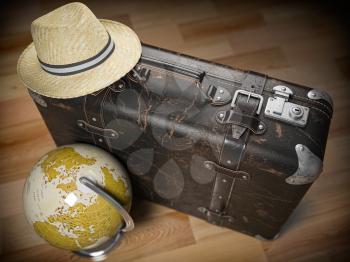 Tourism and travel concept. Globe and vintage suitcase with summer hat. 3d illustration