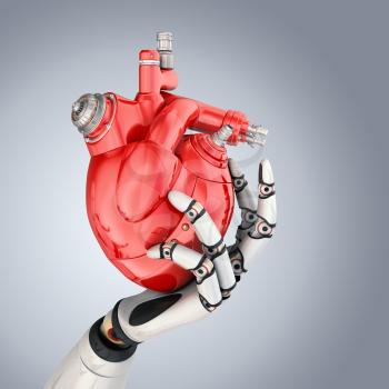 Mechanical heart in robots hand. Clipping path included