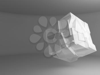 Abstract white flying crystal cube object with chaotic fragmentation is in an empty gray interior, 3d rendering illustration