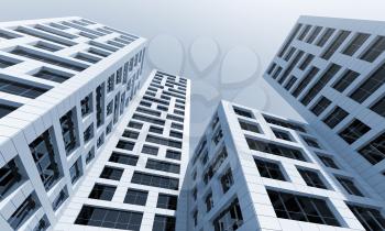 Abstract modern architecture. Perspective of tall office towers under blue sky. 3d render illustration