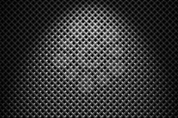 Braided diagonally oriented wire steel grid with reflections on black background under the spot light, abstract textured background