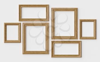 Wooden blank picture or photo frames on white wall with shadows, decorative wooden picture frames template set, art frame mock-up 3D illustration