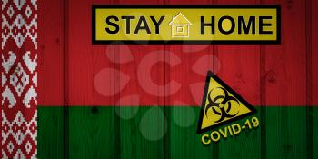 Flag of the Belarus in original proportions. Quarantine and isolation - Stay at home. flag with biohazard symbol and inscription COVID-19.