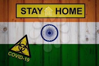 Flag of the India in original proportions. Quarantine and isolation - Stay at home. flag with biohazard symbol and inscription COVID-19.