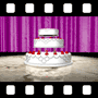 Revolving wedding cake on marble floor