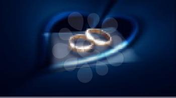 Royalty Free Video of Rotating Wedding Rings on a Pillow